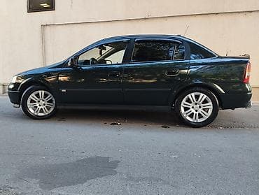 lada vaz 2101: Opel Astra: 1.6 l | 1999 il 400 km Sedan — 6