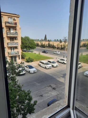 Xətai metrosunun yaxınlığında 5 mertebeli binanın 4-cü mərtəbəsində — 6