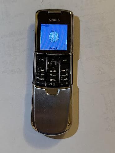 Техника и электроника: Nokia 1, цвет - Серебристый, Кнопочный — 1