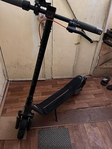 electro gitara: Elektrikli skuter – Xiaomi/Ninebot üslubunda şəhər üçün rahat model — 1