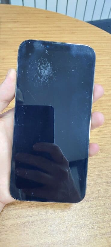 a 80 2020: IPhone 14, 128 GB, Mavi, Face ID — 13