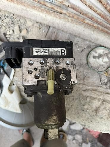su daciki: Toyota ABS nasos bloku (hidravlik modul + idarəetmə beyni) - Brend — 1