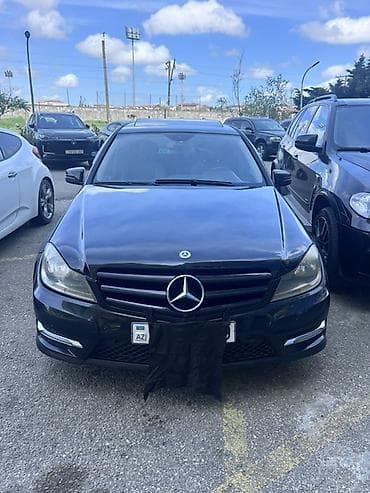 Mercedes-Benz C‑Class sedan (W204) – qara rəng, AMG paketli görünüş