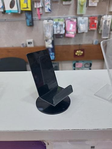 ev radiator: Telefon vitrini ucun pastavkalar telefon tutacaqi vitrinler dukan — 5