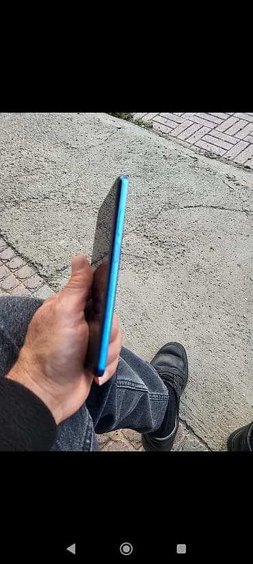 tp link internet modem: Məhsul: Mavi rəngli smartfon Xüsusiyyətlər - Ekran: Tam ekran. ön — 4