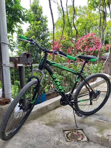 velosiped isma: START markalı, qara və yaşıl rənglərdə olan dağ velosipedi. Dağ — 3