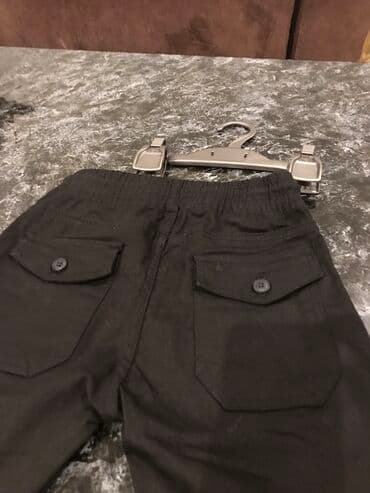 salvarlar ve koftalar: Qara karqo cibli şalvar yenidir 9 yaş rəngi tünd qaradlr şəkildə acıq — 2