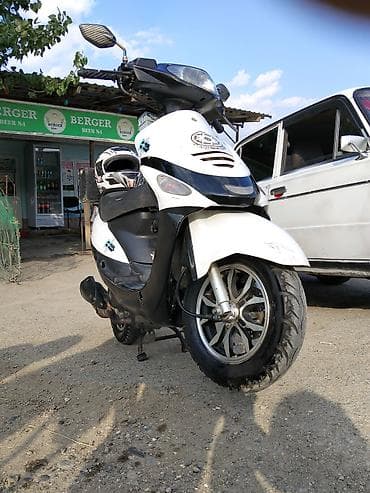 moto n50: Skuter – XRoad, ağ/qara rəng Texniki xüsusiyyətlər və detallar: - — 5