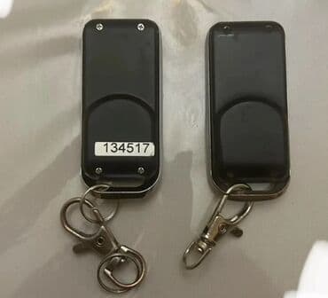 Детали коробки передач: İki ədəd çoxfunksiyalı uzaqdan idarəetmə pulti (açarqaşlı) — 2