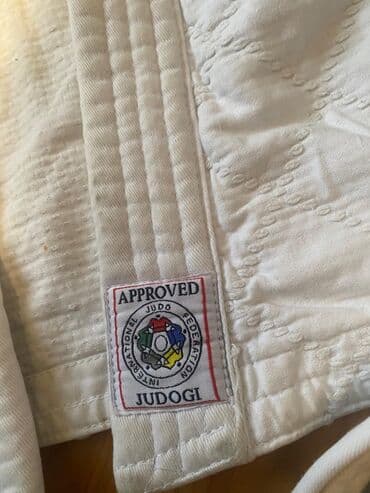 ağ şalvar: Judo gi dəsti – IJF təsdiqli • Rəng: ağ • Komplekt: üst geyim (jaket) — 2
