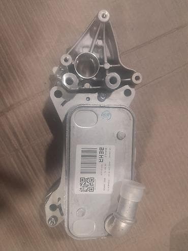 06 oturacaqlari: MAHLE/BEHR yağ-soyuducu (oil cooler) modulu - Brend: MAHLE / BEHR - — 3