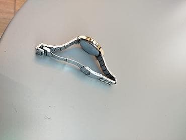 Zərgərlik əşyaları: Qol saatı, Swiss — 3