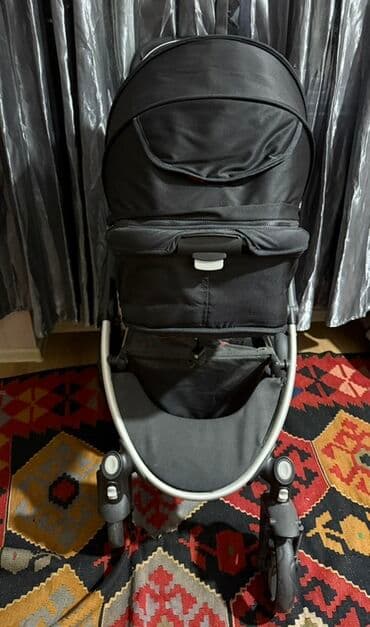 mutsy igo universal arabalar: Uşaq arabası – çoxfunksiyalı, qara-rəngli şassi və qırmızı içliklə — 4