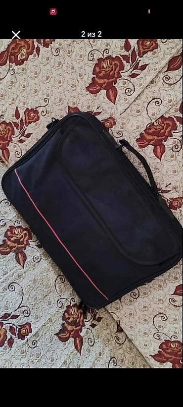 notebook ucuz: Noutbuk çantası – klassik qara rəngdə, ön hissədə nazik qırmızı xətt — 1