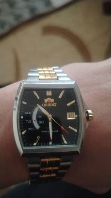 saat 925: Qol saatı, Orient, rəng - Qızılı — 1