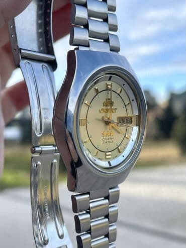 irshad telecom qol saatlari: İşlənmiş, Qol saatı, Orient, rəng - Qızılı — 7