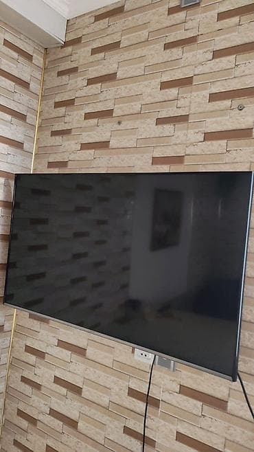 Böyük ekranlı divar tipli televizor - Təxmini diaqonal: 55–65 düym