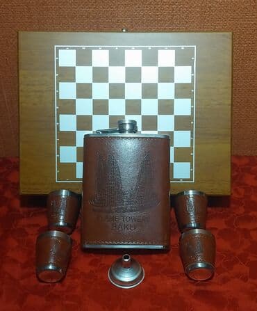 gitara qabi: İçki qabı dəsti şahmat lövhəsi ilə birlikdə satılır. Üzərində Alov — 9