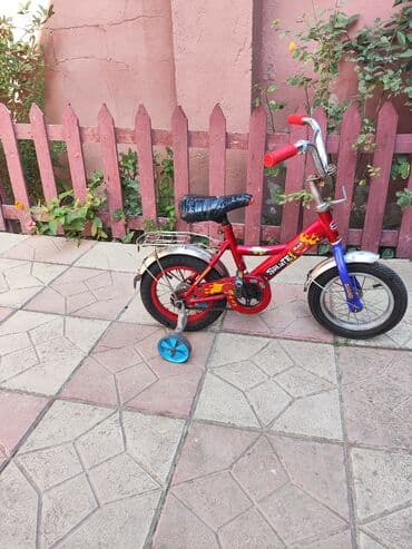 велосипеды 12 дюймов: Şəkillərdə qırmızı rəngli uşaq velosipedi təsvir edilmişdir — 3