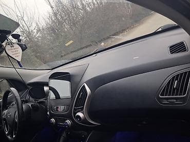 запчасти opel omega b: Hyundai ix35 – qara rəngli, şəhər və uzun yol üçün rahat krossover — 3