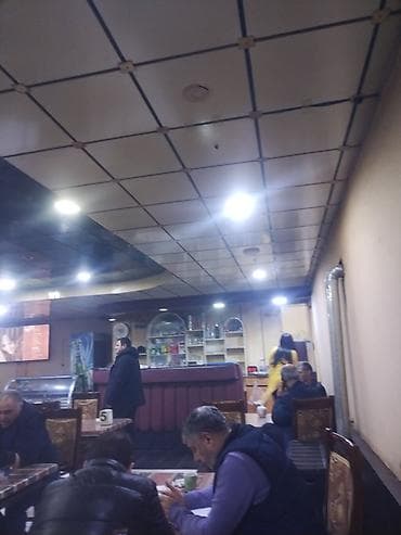 20 yanvarda heyet evleri: - Daxili dekor: mozaik naxışlı oturacaq arkalıqları - Zalda sıra — 1