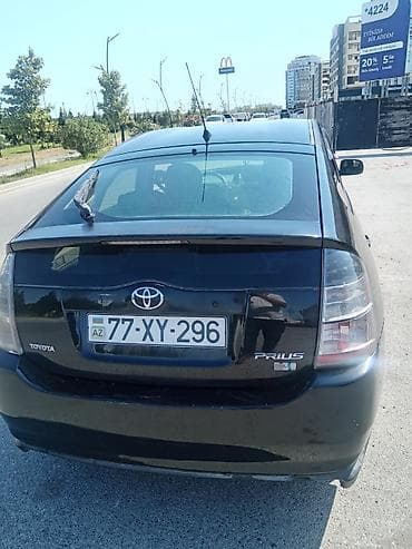sprinter satisi: Toyota Prius (2-ci nəsil) hibrid hetçbek - Rəng: qara - Kuzov: 5 — 2