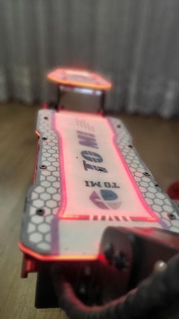 İdman və hobbi: Elektrik skuter – TOMI brendi Xüsusiyyətlər: - Güclü ikili — 1