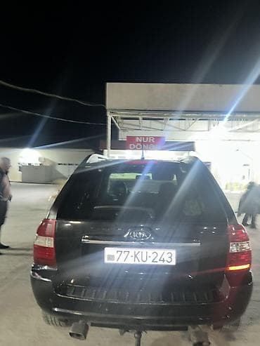 opel astra kompressor: Kia Sportage: 2 l | 2007 il Krossover — 2