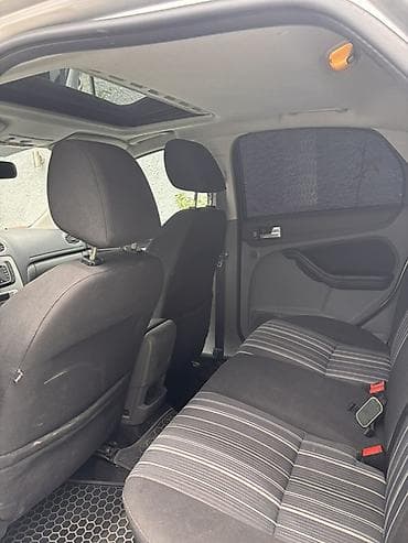 elantra duman: Ford Focus – gümüşü rəng, 5 qapılı hetçbek. Texniki və xarici — 4