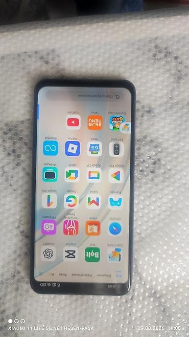 telfonlar: Redmi smartfon + 2 ədəd qab - Model: Redmi (arxa tərəfdə “Redmi” — 6