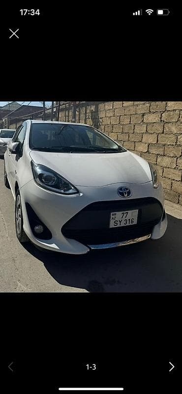 Toyota Aqua: 1.5 l | 2018 il Hetçbek