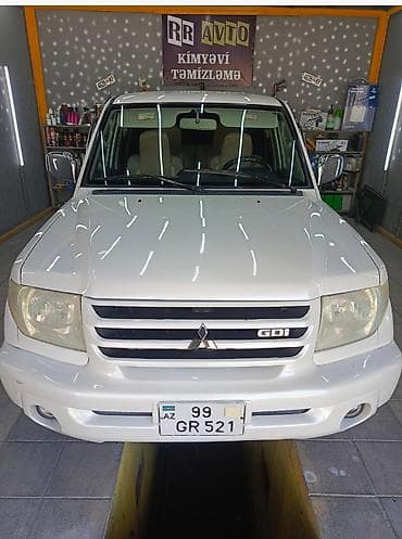 renault megane motoru: Mitsubishi Pajero iO (GDI) – 5 qapılı kompakt off-road SUV. il:2000 — 1