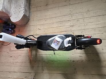 Elektrik skuter – qara/qırmızı dizayn, güclü şəhər və off-road yürüşü