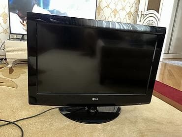 korpus hp: LG LCD televizor - Ekran diaqonalı təxminən 24–26 düym, parlaq qara — 1