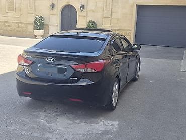 qara 07 sekilleri: Hyundai Elantra Limited – sedan Xüsusiyyətlər: - Korpus rəngi: qara - — 3