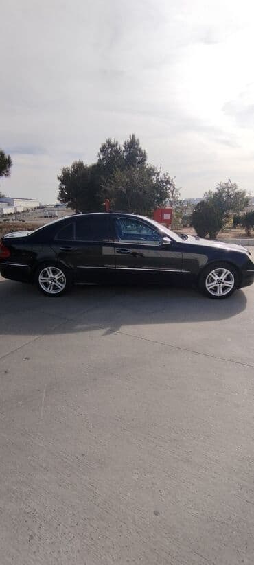 bmw 7 серия 725tds at: Mercedes-Benz E 220: 2.2 l | 2007 il Sedan — 28