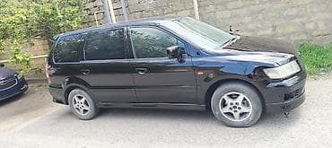 Nəqliyyat: Mitsubishi Chariot: 2.4 l | 2000 il 5000 km Universal — 3