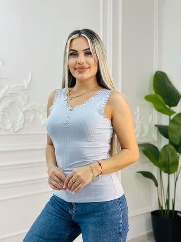 женские удлиненные футболки: Bu qadın maykası gündəlik geyim üçün rahat və çoxfunksiyalı seçimdir — 3