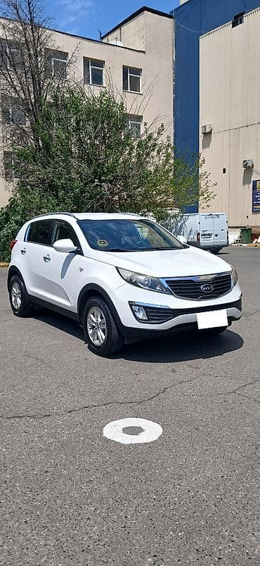 Kia Sportage: 2 л | 2013 г. Внедорожник — 10