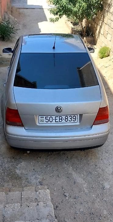 Volkswagen Bora (sedan), gümüşü rəng. - Salon: qara parça oturacaqlar — 5