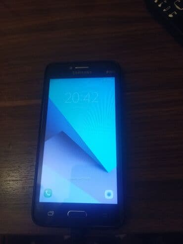 xor telefon: Samsung J210, 8 GB, rəng - Qara, İki sim kartlı — 1