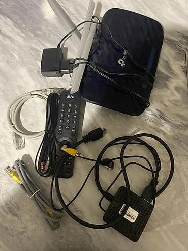 TP-Link Wi‑Fi router və IPTV set-top box komplekti Tərkib: - TP-Link