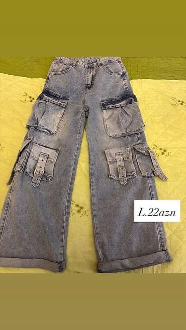 Model: Geniş kəsimli yüklü (cargo) cins şalvar Rəng: Açıq/mavi