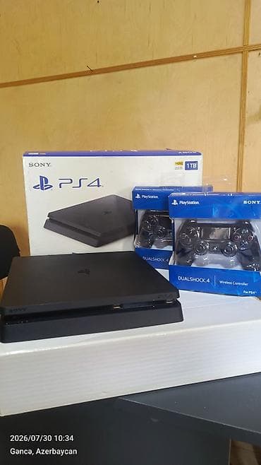 Sony PlayStation 4 (PS4) Slim – 1 TB, Jet Black Komplekt: - PS4 Slim lalafo.az -da Sony PlayStation 4 (PS4) Slim – 1 TB, Jet Black Komplekt: - PS4 Slim