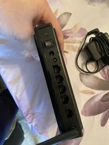 tp link modem qiymeti: Upvel şirkətindən olan qara rəngli router. Evdə və ya ofisdə internetə — 2