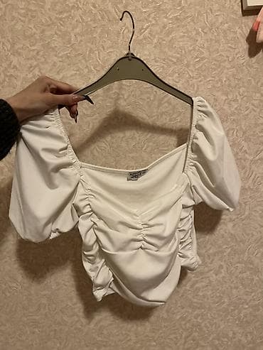 ağ canta: Ağ rəngli qısa top hec geyinilmiyib standart olcu,etiketde L dir amma — 2