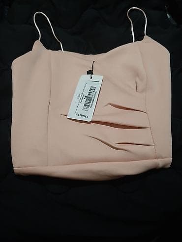 klyoş qadın ətəkləri: Zərif qadın kokteyl donu – açıq şaftalı rəngdə, bədənə oturan siluet — 3