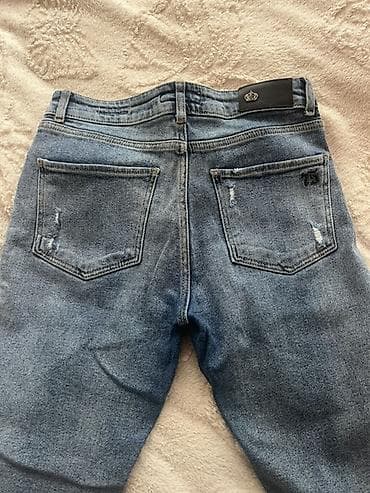 cibli şalvar: Mavi solğun yuma effekti olan dar kəsim cins şalvar. Xüsusiyyətlər — 2