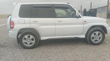 daewoo lanos nece masindir: Mitsubishi Pajero iO (GDI) – ağ rəngli, 5 qapılı kompakt SUV. İlkin — 8