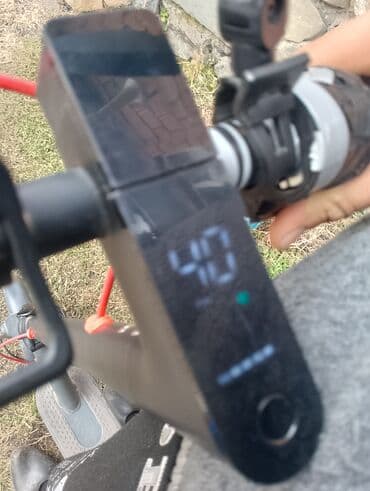 elektrikli scooter qiymetleri: Elektrikli skuter - Rəng: tünd boz/qara - Ön və arxa təkərli, arxa — 1